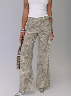 side view of model wearing Princess Polly Mckinley Mid Rise Wide Leg Jeans Camouflage Mid Rise Jeans 