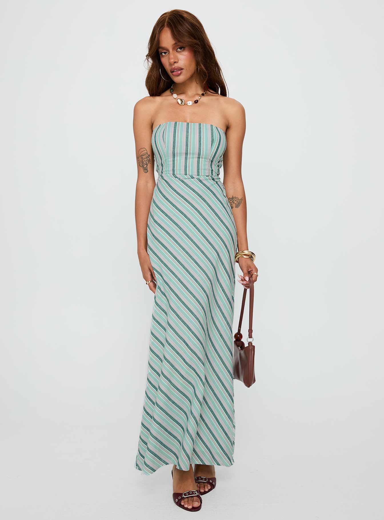 side view of model wearing Princess Polly Finchie Strapless Maxi Dress Blue Stripe Straight Neck 