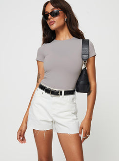 front view of model wearing Princess Polly Jannika Shorts White Denim High Waisted Shorts 