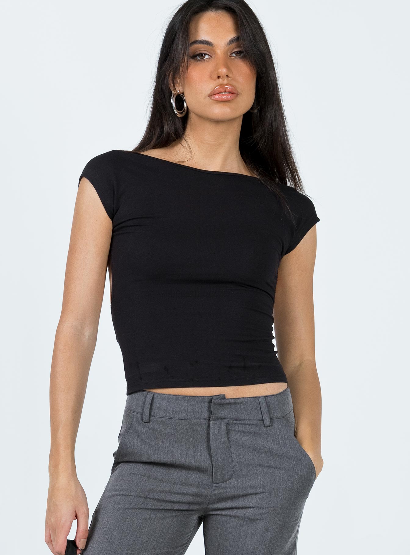 Front view of model wearing  front Princess Polly Short Sleeves Square Neck  Rosalinda Top Black Lower Impact