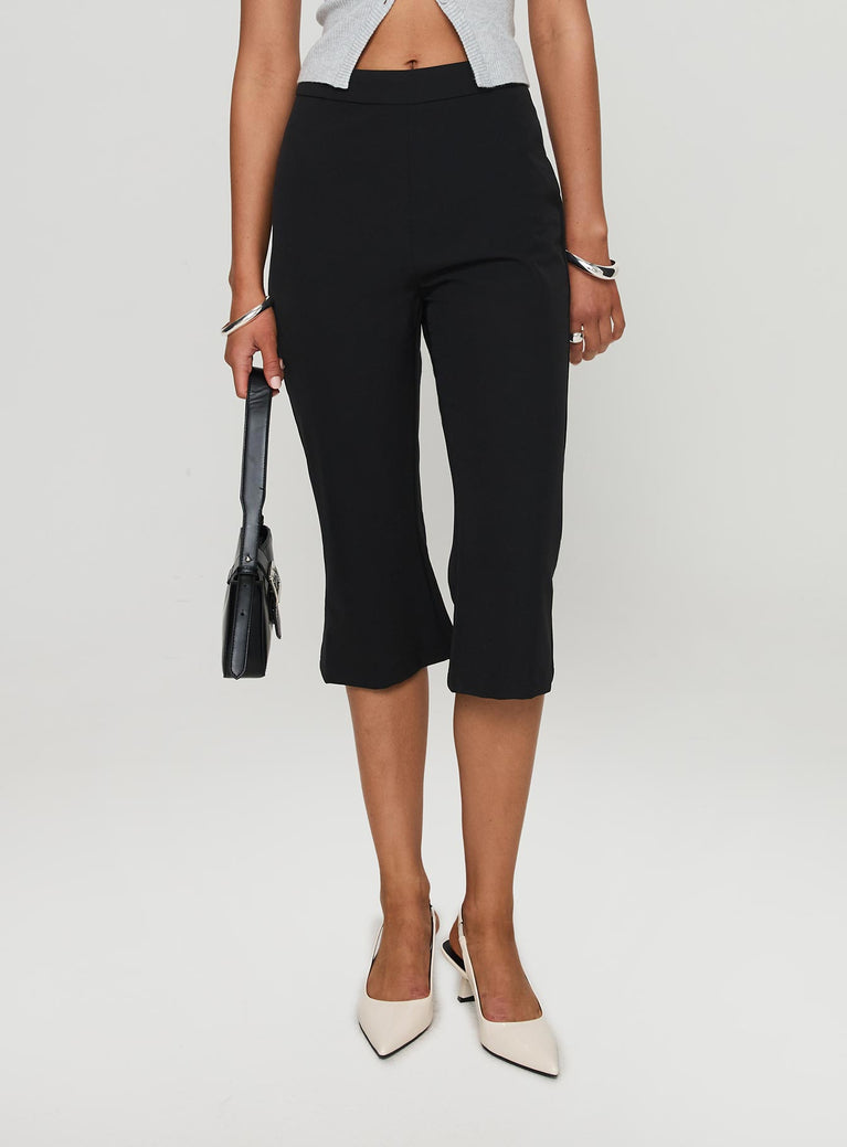 Pants High rise fit, capri length, slight flare in leg, invisible zip fastening Slight stretch, unlined 