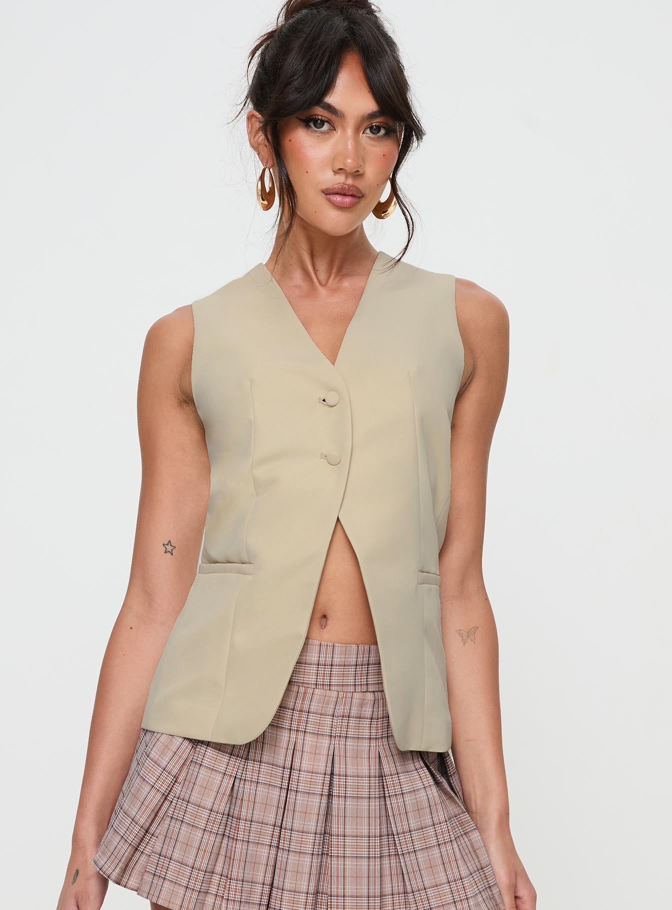 front view of model wearing Princess Polly Dovesie Vest Top Beige Sleeveless V-Neck 