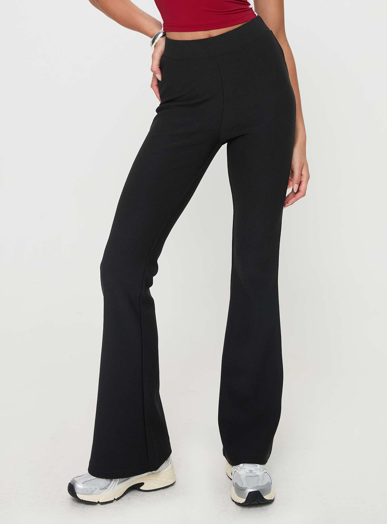 front view of model wearing Princess Polly Vasquez Flared Pants Black High Waisted Pants 