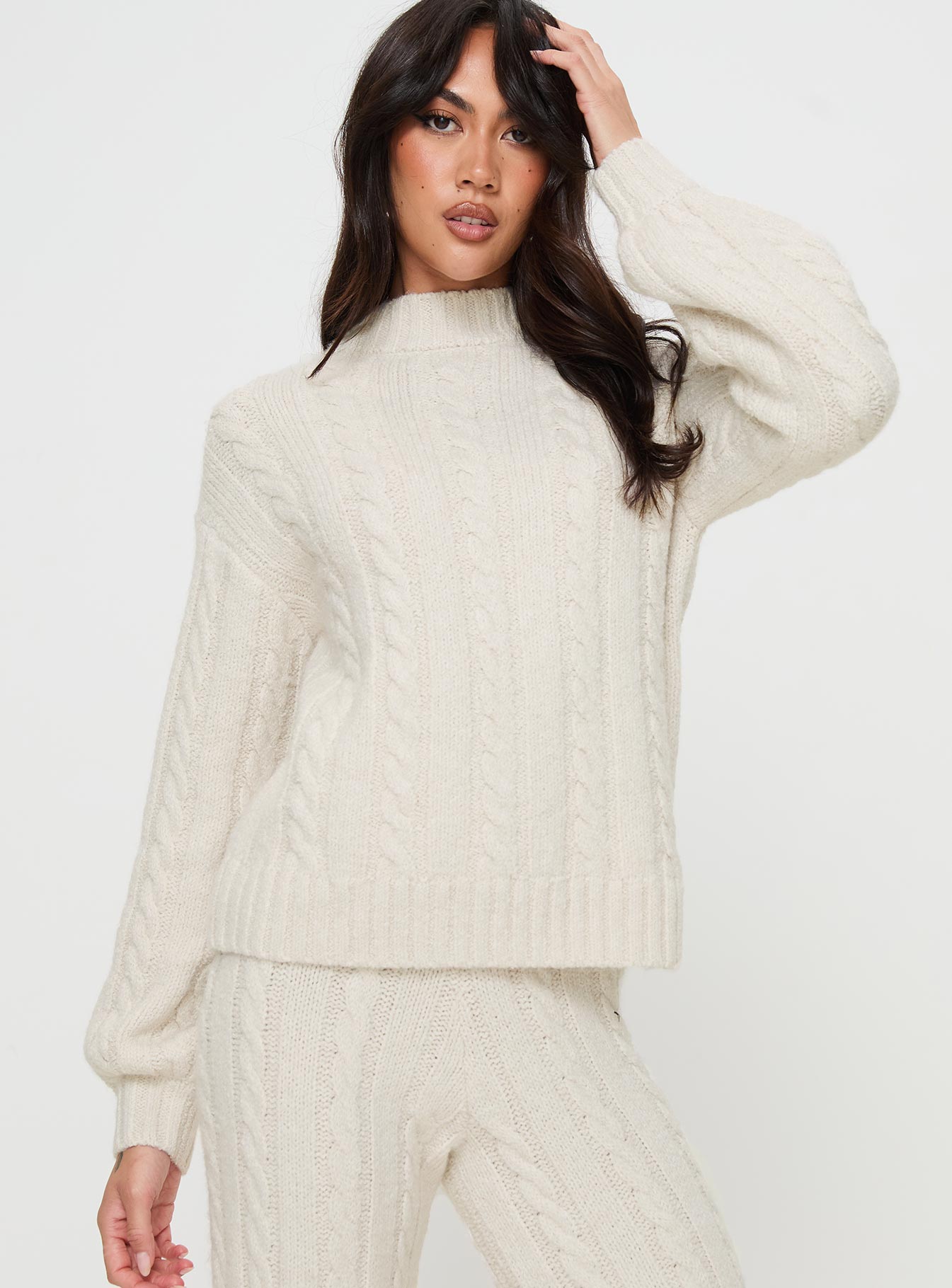 front view of model wearing Princess Polly Sharif Cable Knit Sweater Beige regular 