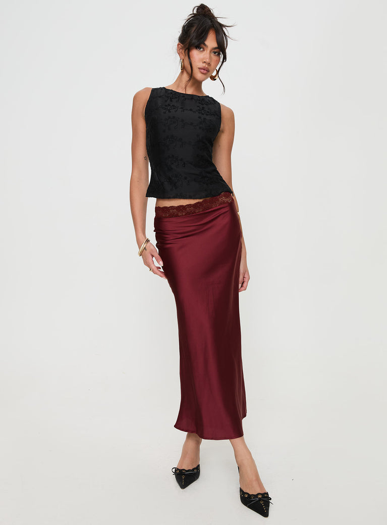   side view of model wearing Princess Polly The Charmaine Maxi Skirt Burgundy Midi Skirts 