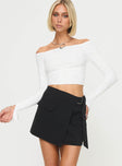 Black mini skirt Wrap style, pocket &amp; buckle detail, invisible zip fastening