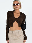 Brown long sleeve top Popcorn puff material  Classic collar  V neckline  Button front fastening 