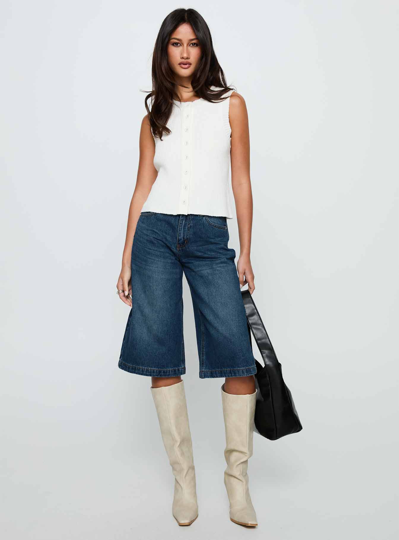 back view of model wearing Princess Polly Ollison Longline Denim Shorts Blue High Waisted Shorts 