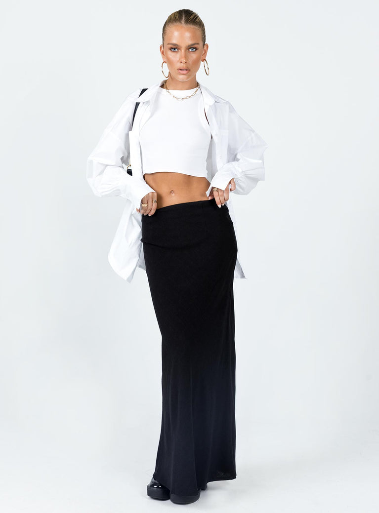   front view of model wearing Princess Polly Jodie Maxi Skirt Black Petite Maxi 