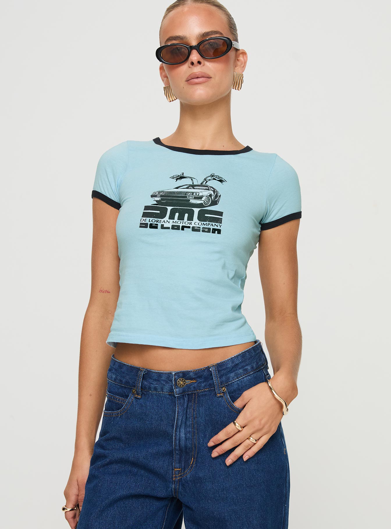 front view of model wearing Princess Polly Delorean Tee Blue Short Sleeves Crew Neck 