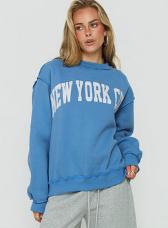 Discover the When In New York City Oversized Jumper Blue womens jumper with long fit detail view of model wearing Princess Polly