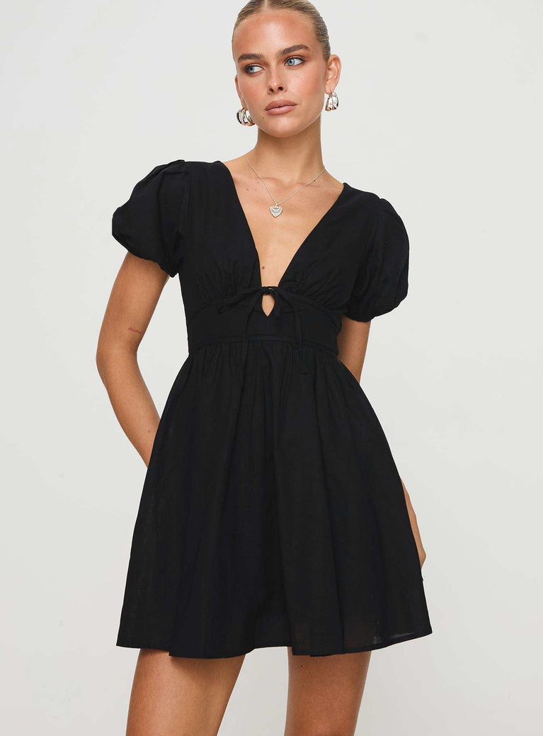 V neck mini dress Tie fastening at front, puff sleeves, invisible zip fastening at back  Non-stretch, partially lined  