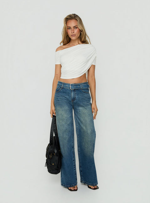 Showcasing Charlotta Low Rise Super Baggy Jeans Mid Blue womens-jeans front view of model wearing Princess Polly