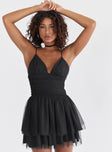 Mini dress, plunging neckline Adjustable shoulder straps, rushing at waist, tiered skirt, invisible zip fastening
