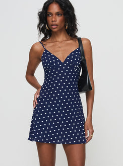 side view of model wearing Princess Polly Chara Mini Dress Navy V-Neck 
