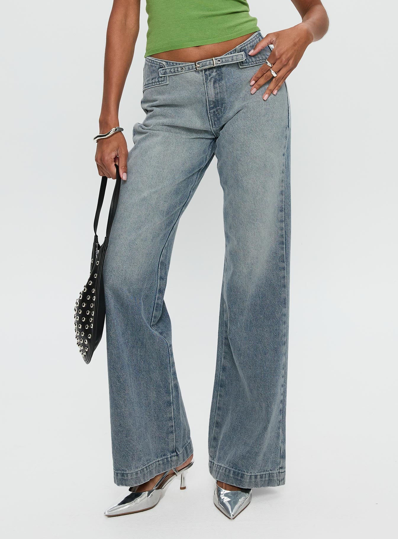 back view of model wearing Princess Polly Slow Ride Belted Jeans Light Blue Mid Rise 