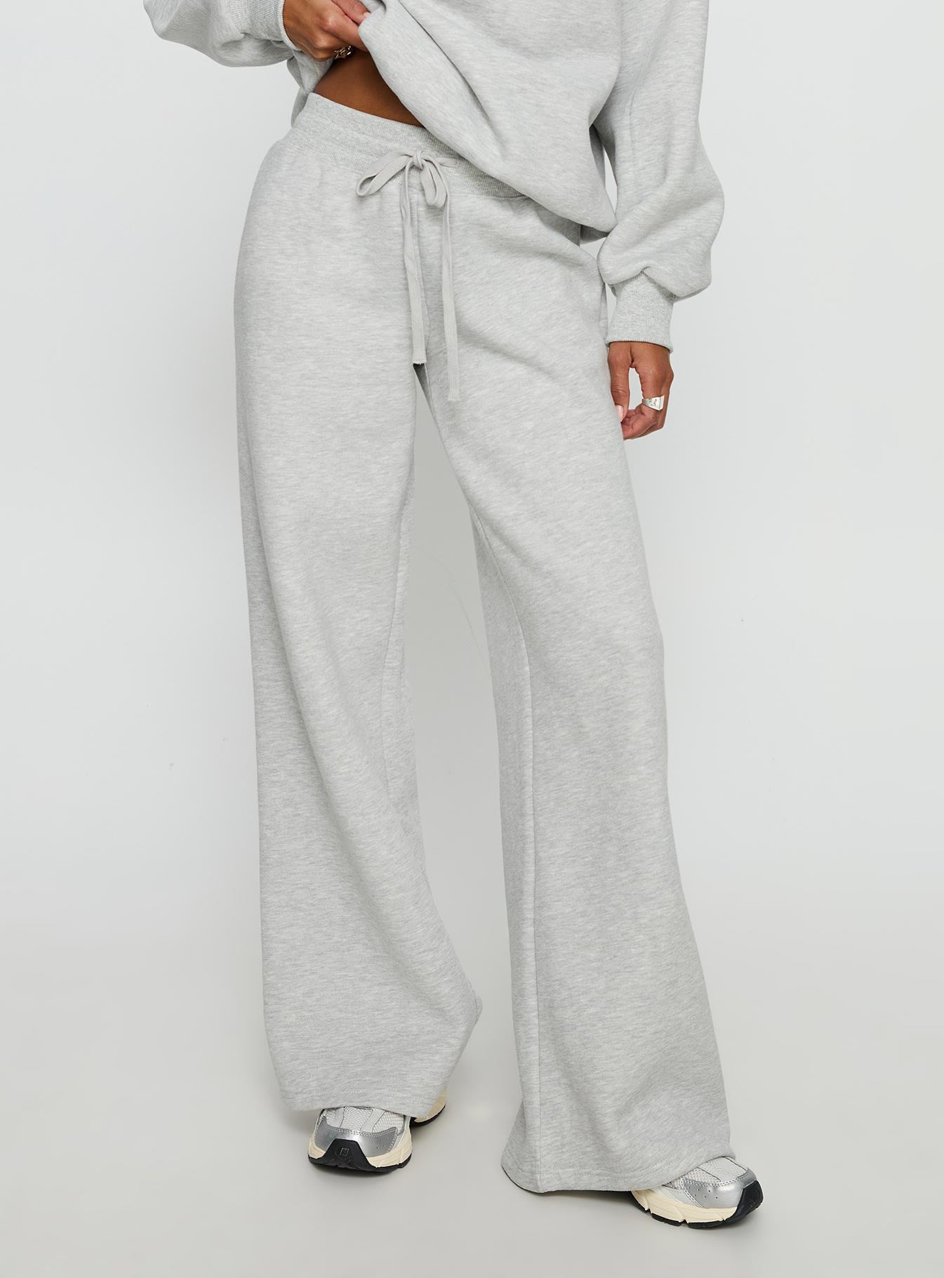front view of model wearing Princess Polly Princess Polly Stargirl Wide Leg Sweat Pants Grey Marle High Rise Pants 