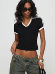 front view of model wearing Princess Polly Kortney Top Black Short Sleeves V-Neck 