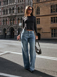 side view of model wearing Princess Polly Serenitia Mid Rise Relaxed Jeans Light Wash Mid Rise 