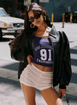 side view of model wearing Princess Polly Angelis Lace Shorts White High Waisted Shorts 