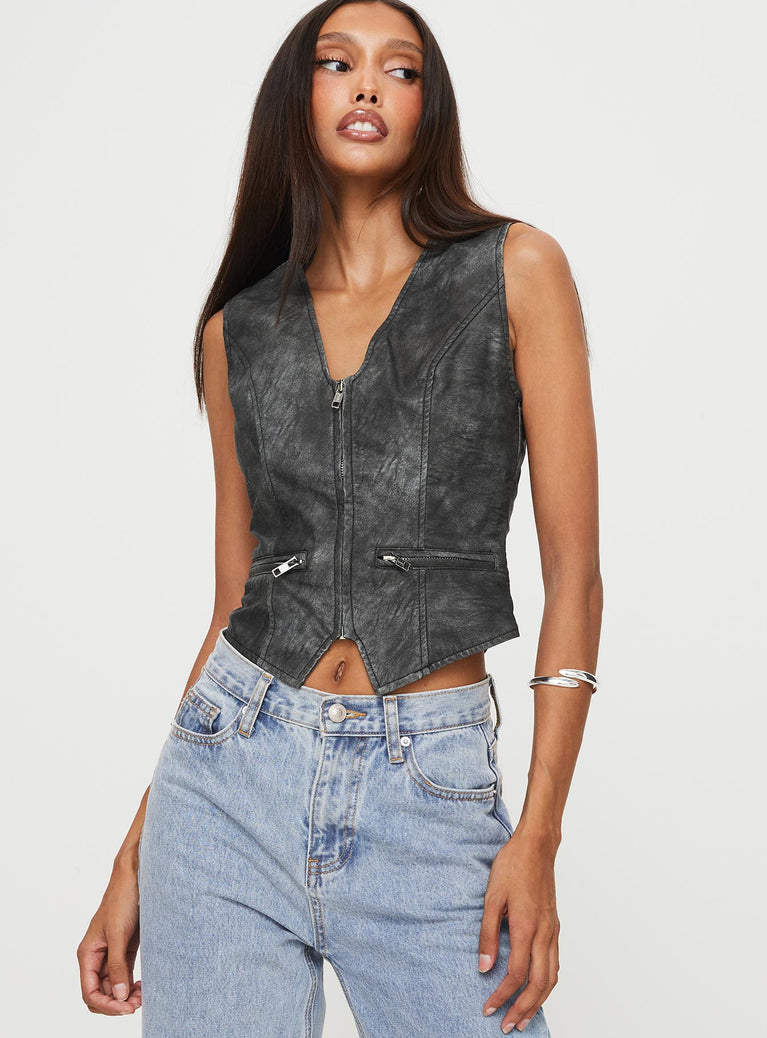 Faux leather vest top V neckline, zip fastening down front, twin faux pockets, pointed hem