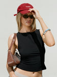 side view of model wearing Princess Polly Bleeker High Neck Top Black Sleeveless Boat Neck 