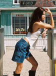 back view of model wearing Princess Polly Mika Carpenter Denim Shorts Mid Wash Lower Impact High Waisted Shorts 