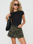 front view of model wearing Princess Polly Remington Skort Green Camo mid-rise 