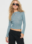 Long sleeve top Knit material, crew neckline, open back, adjustable straps at back Non-stretch material, unlined, sheer