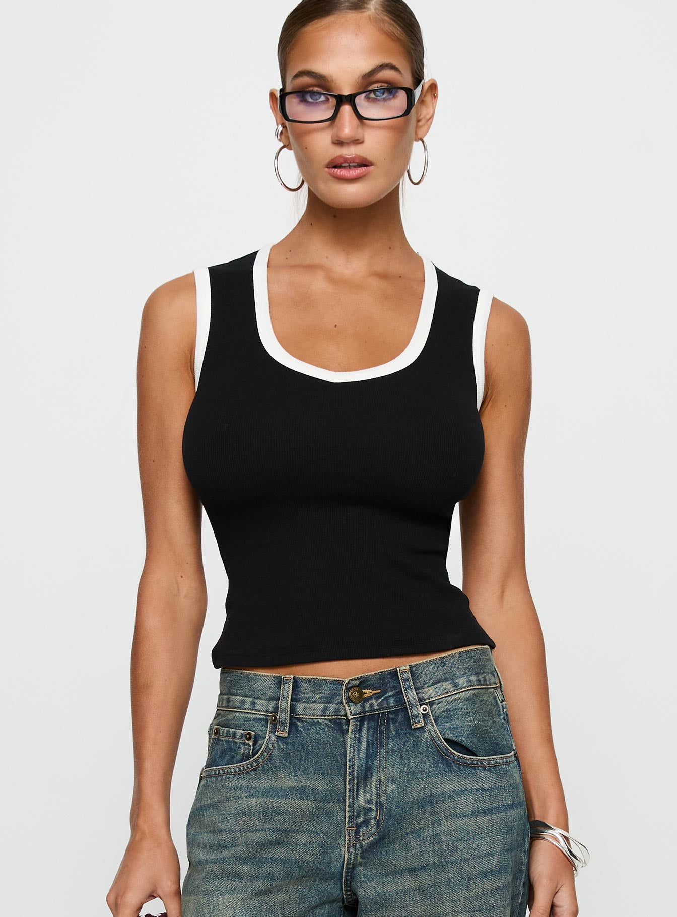 front view of model wearing Princess Polly Start Me Up Top Black / White Sleeveless Scoop Neck 