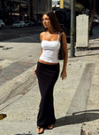   side view of model wearing Princess Polly Jodie Maxi Skirt Black Petite Maxi 