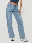 side view of model wearing Princess Polly Serenitia Mid Rise Relaxed Jeans Light Wash Petite Mid Rise 