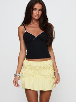   front view of model wearing Princess Polly Kiwie Ruched Mini Skirt Butter Yellow Mini Skirts 