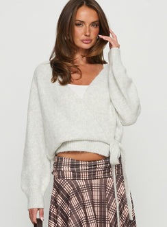 front view of model wearing Princess Polly Daelan Wrap Knit Cardigan Grey Marle cropped 