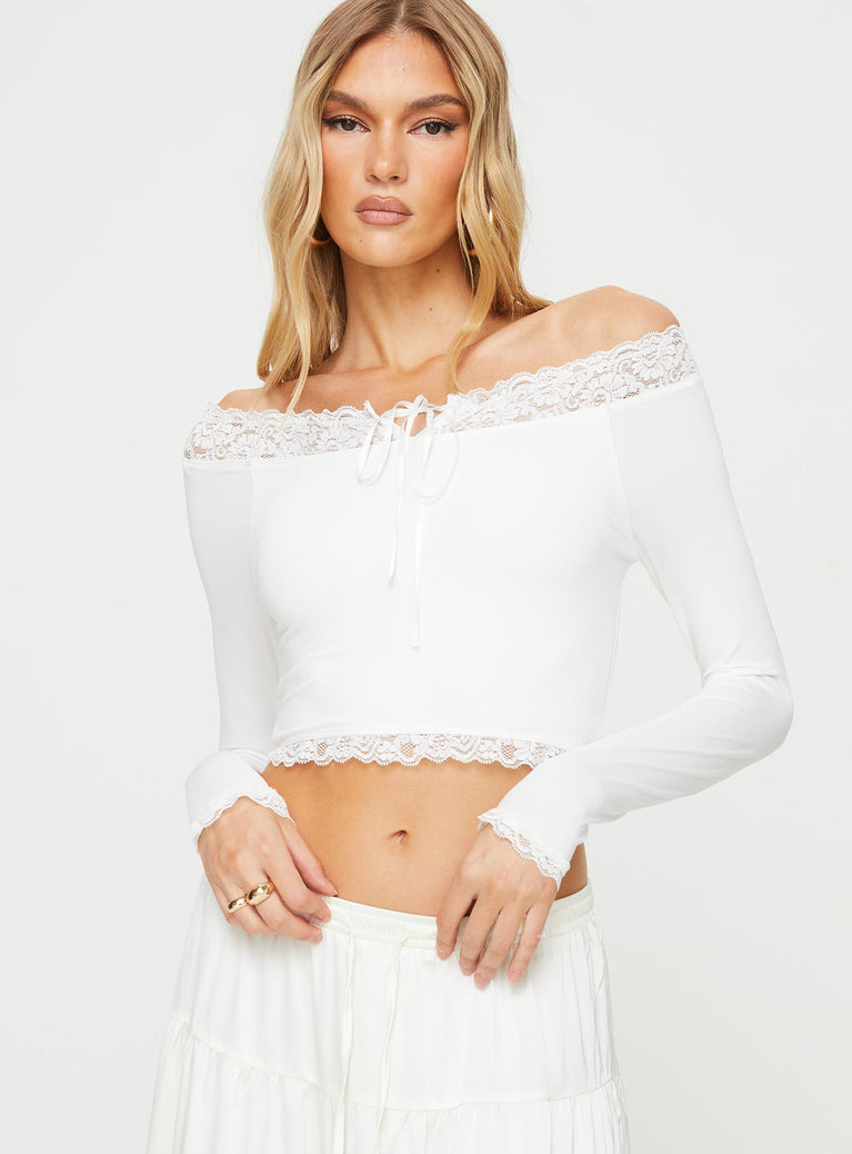 Off the shoulder crop top Lace trim at shoulders & hem, tie detail at bust Good stretch, unlined  Princess Polly Lower Impact
