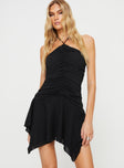 Front view of model wearing  front Princess Polly Asymmetric Neckline  Malas Halter Mini Dress Black