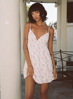 side view of model wearing Princess Polly Koko Mini Dress Cream Floral Plunger 
