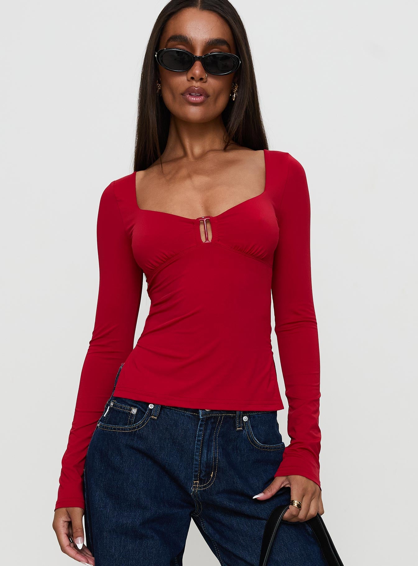 front view of model wearing Princess Polly Keane Long Sleeve Top Red Full Sleeves Sweetheart 