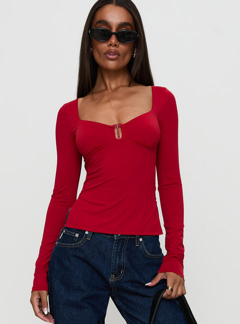 front view of model wearing Princess Polly Keane Long Sleeve Top Red Full Sleeves Sweetheart 