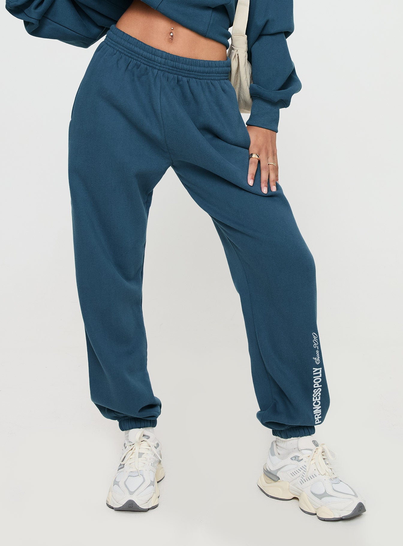 Princess polly track pants block / cursive text slate