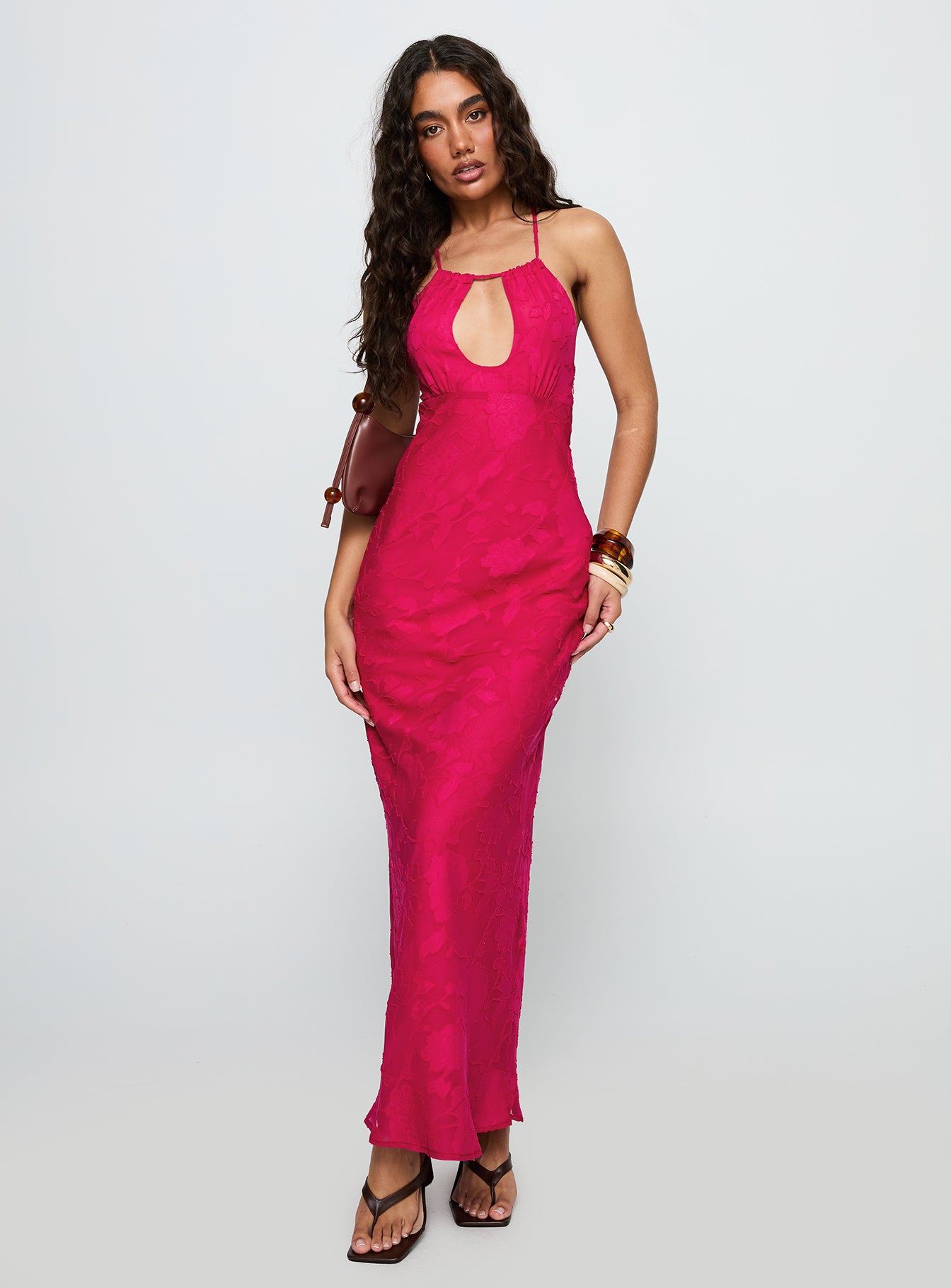 side view of model wearing Princess Polly Magnetic Halter Maxi Dress Hot Pink Crew Neck 