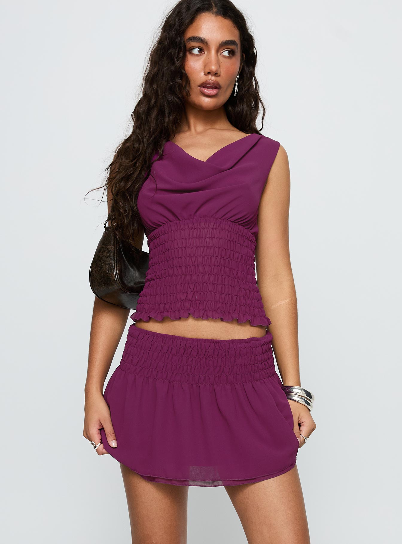 back view of model wearing Princess Polly I Belong Shirred Mini Skirt Wine Mini Skirts 