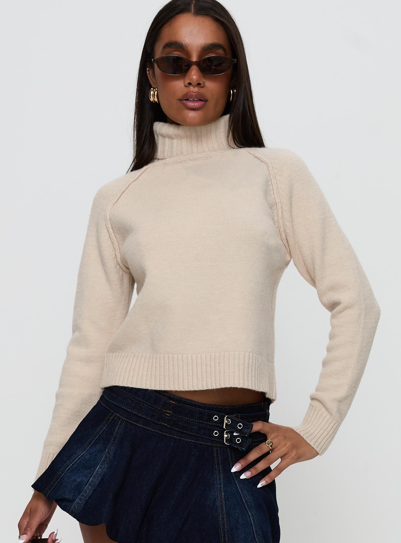 front view of model wearing Princess Polly Enrica Funnel Neck Knit Sweater Cream Cropped 