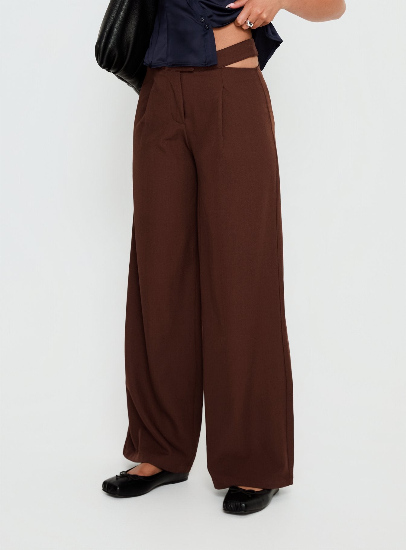 side view of model wearing Princess Polly Alys Cut Out Straight Leg Pant Brown Mid Rise Pants 