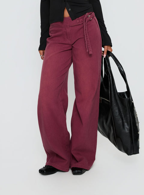 side view of model wearing Princess Polly Boxie Mid Rise Wide Leg Jeans Washed Burgundy Mid Rise Jeans 