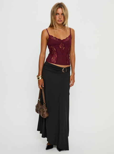   side view of model wearing Princess Polly Nola Hardware Slit Maxi Skirt Black 