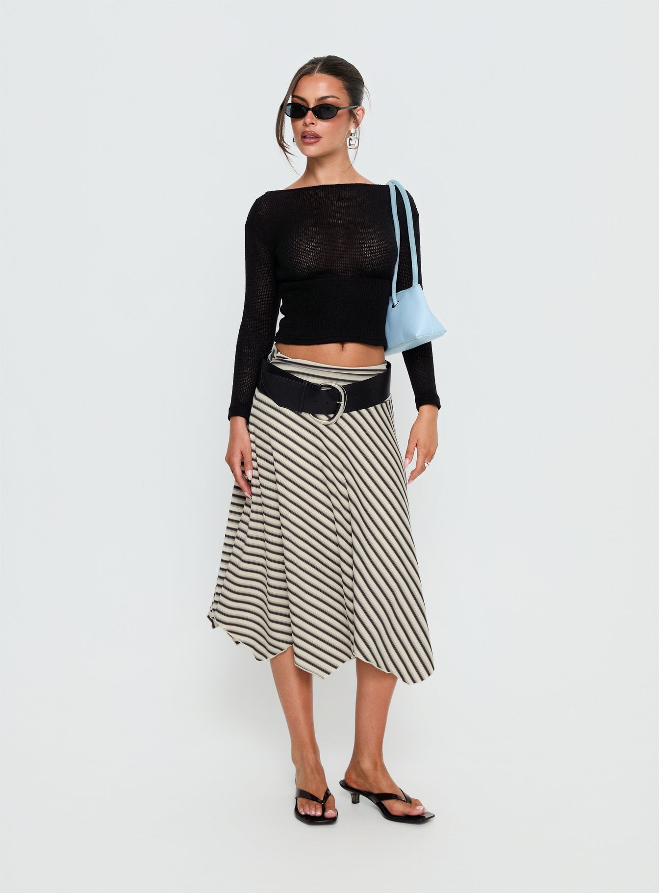   side view of model wearing Princess Polly Cobee Asymmetrical Midi Skirt Multi Stripe Midi Skirts 