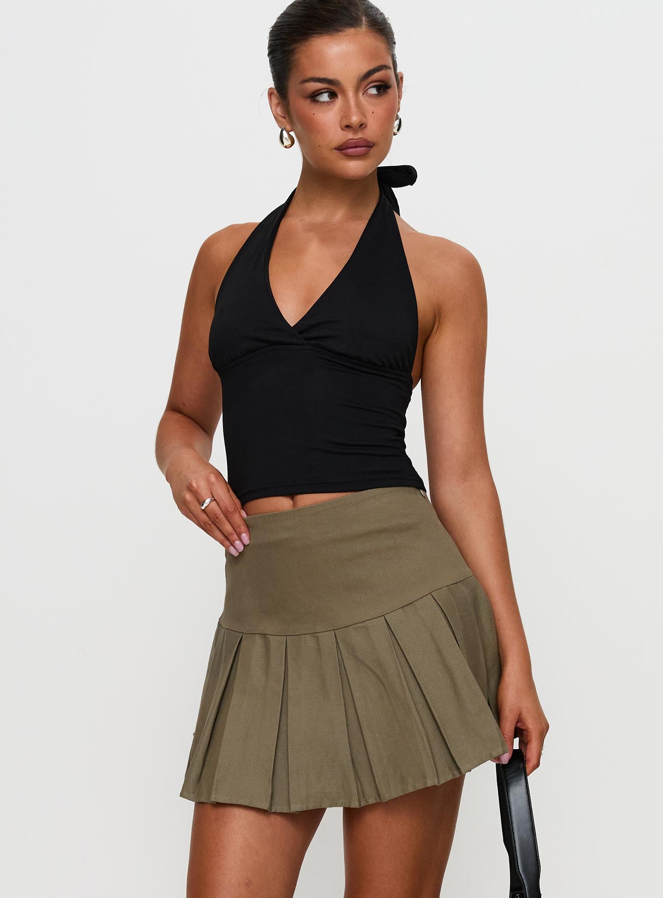   front view of model wearing Princess Polly Feodora Pleat Mini Skirt Khaki Mini Skirts 