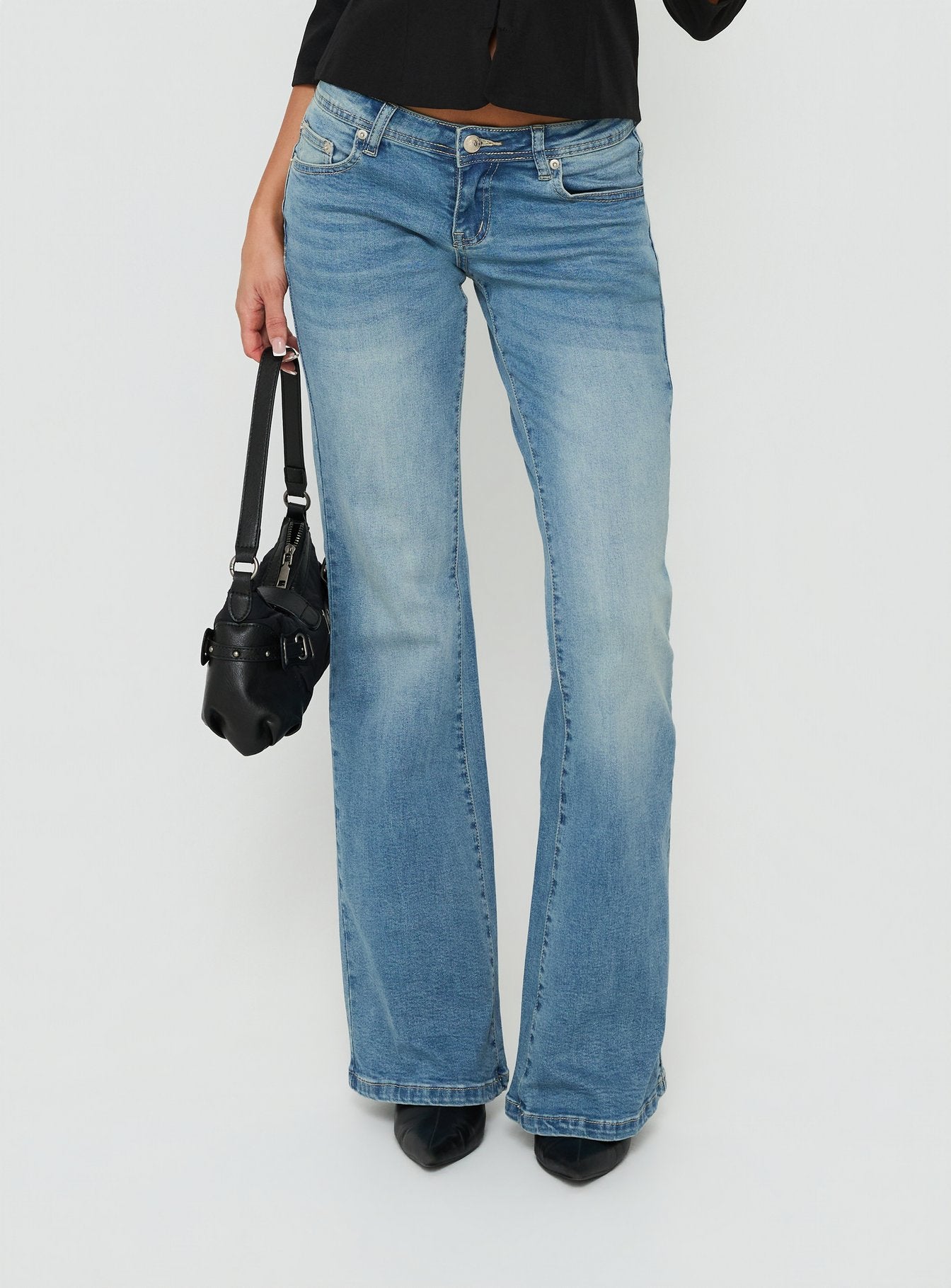 Alyss Ultra Low Rise Flared Jeans Light Vintage Blue | Princess Polly