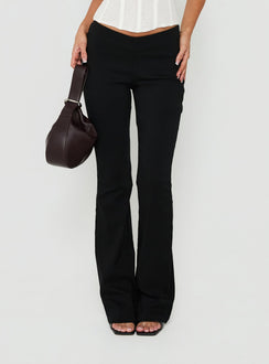 Showcasing the Zeni V Waist Bootleg Pants Black womens-regular-pants in mid-rise product view of model wearing